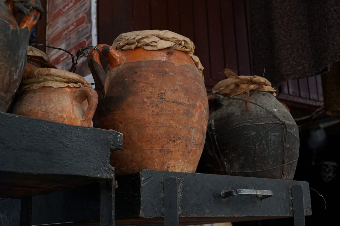 Tanjia jars waiting by the fire, in Marrakech